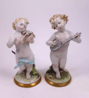 Buy Pair Of Capodimonte Putti Cherub Figures Playing Instruments - A/f • 20£
