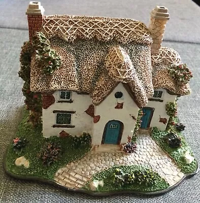 Buy Unmarked Thatched Cottage Ornament • 8£