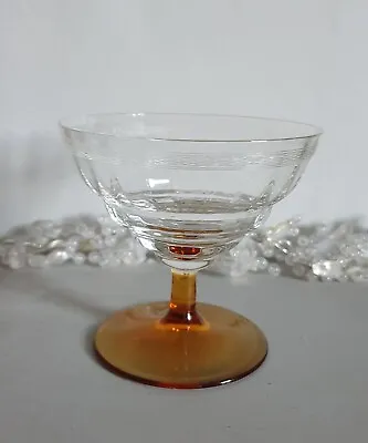https://www.pips-trip.co.uk/img/NLoAAOSwQftkRk5K/1930s-etched-crystal-champagne-sherbert-glass-with-amber.webp