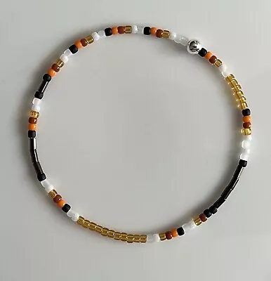 Buy Orange Petite Glass Seed Beaded Minimalist Friendship Bracelet • 2£