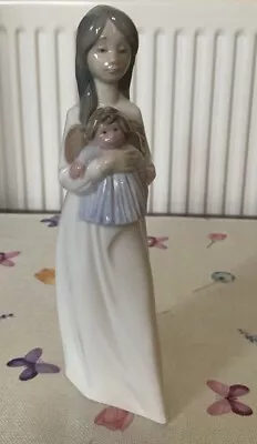 Buy Nao/lladro Young Lady Holding Baby In Her Arms Figurines Used • 7.50£