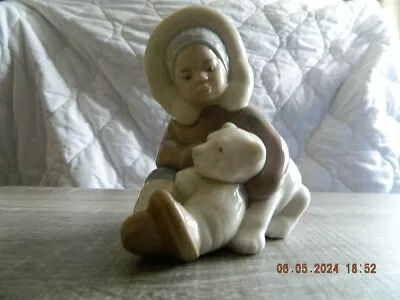 Buy Lladro Eskimo Boy Sitting Cuddling A Polar Bear, Super Condition. • 22£
