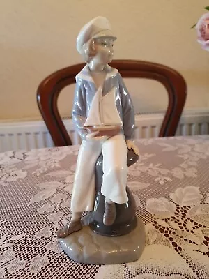 Buy Retired Lladro Porcelain #4810 Sailor Boy With Yacht Sailboat Figurine 9  • 30£