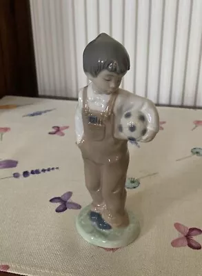 Buy Nao Lladro Figurines Boy Holding Football • 7.50£