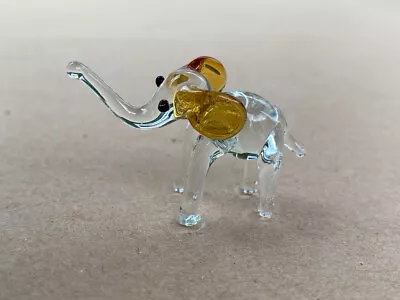 Buy Small Clear Glass Elephant With Orange Coloured Ears • 2£